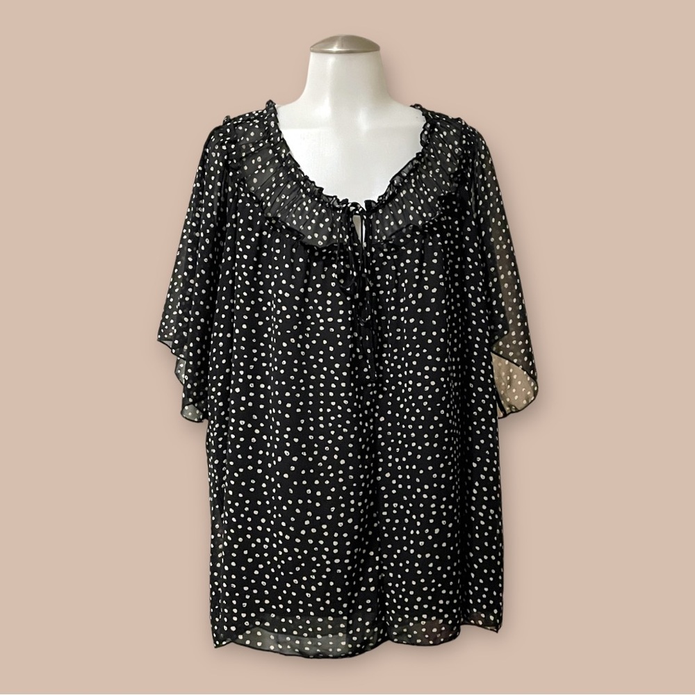 Woman’s size 2X blouse black with polka dots very comfortable and flattering!
